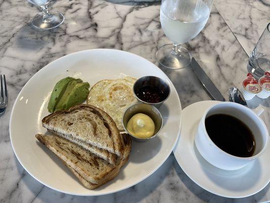 Avocado, rye toast, egg with sides of raspberry preserves and butter, plus very good coffee