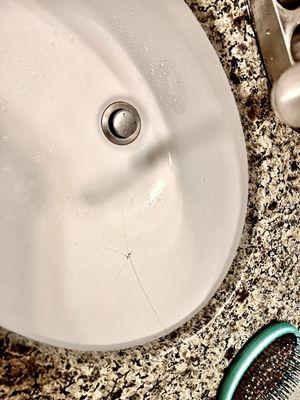 Cracked sink. It's probably been like this for several months.