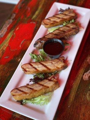 The grilled pork belly is one of our most popular appetizers!