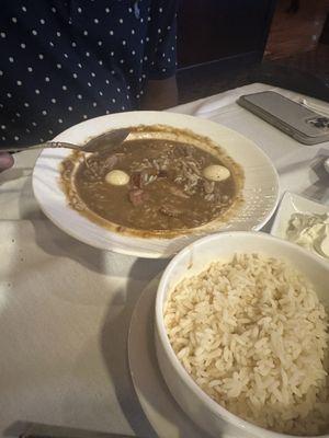 Duck and sausage gumbo with quail eggs