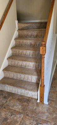 Stairway after supposedly he cleaned the carpet. What's those zigzag lines about??