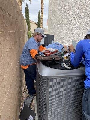 Air Conditioning Techs Installing a New AC Unit