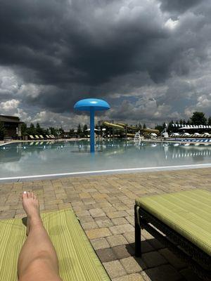 Pool area with water slide. Ignore the storm clouds haha. Usually it's a beautiful day, as it is right now as I type this!