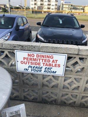 Really?  You can't eat outside at a table on vacation?   EAT IN YOUR ROOM??   WTF??