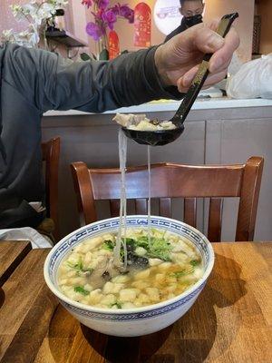 Pita bread soaked clear lamb soup