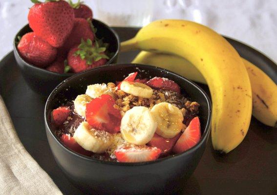 Delicious Acai Bowl served with Acai fruit, granola, banana and blueberries.