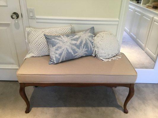 Reupholstered bench with refinished legs.