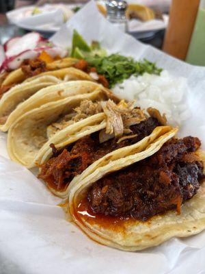 Trying them all. Favorites: Carne Asada and al Pastor.