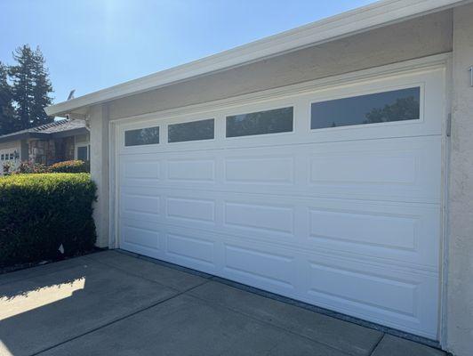 Newly installed Garage door with windows.