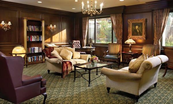 Elegant library ideal for relaxation or conversation.