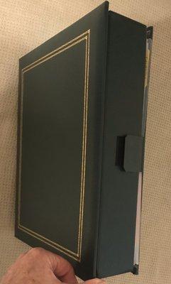 Binder with our Trust Name embossed on the outer edge