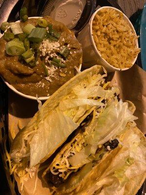 Three taco platter - Bean & Cheese, Chicken, and the notorious Vegan Taco.