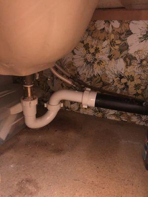 My bathroom sink plastic pipes under counter