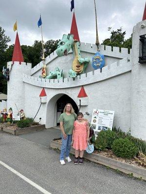 My wife with my granddaughter outside the farm's entrance.