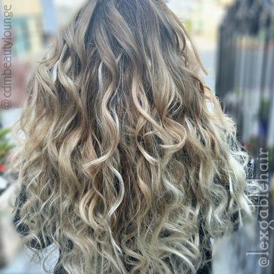 Wavy blonde K-Tip extensions