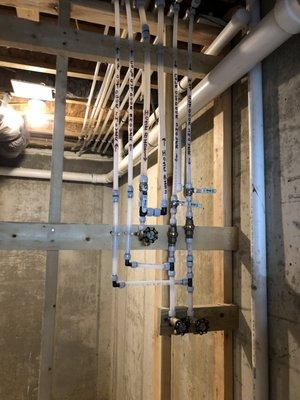 Pex water line configuration. Clean and professional plumbing by Hudson.