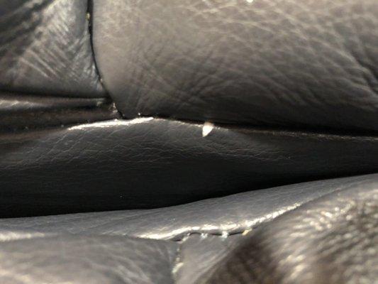 Split seams on leather sofa.