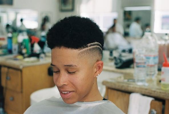 Bald fade with design by Eshawn