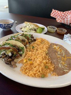 Fat carne asada street tacos, rice and beans and asada Gordita