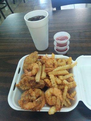 Six wings, six fried shrimp, French fries, and a drink.