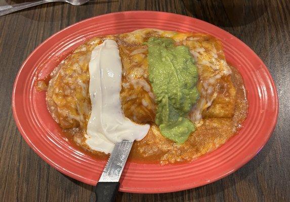 98. The King Burrito Chorizo, Egg, Cheese, Beans, rice Potatoes  Red Sauce w/ Sour Cream and Guacamole