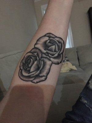 My double rose tattoo after being shaded & re-outlined by Sean at Rock-N-Roll tattoos.