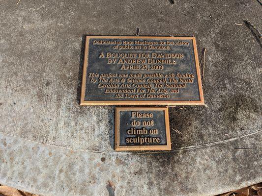 Plaque at the base of A Bouquet for Davidson Sculpture