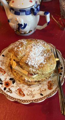 Scone with clotted cream and raspberry