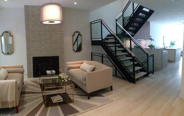 Custom fireplace and staircase in Fort Greene historic frame house