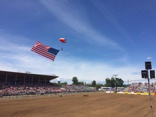 This parachuter perfectly navigated his landing in the center of the rodeo arena! What an entrance!