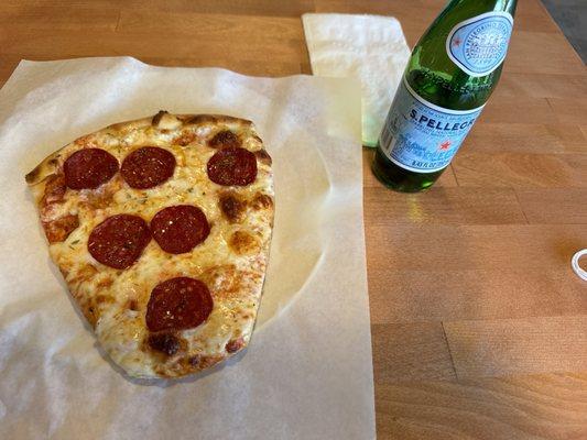 Pepperoni slice fresh from the oven.