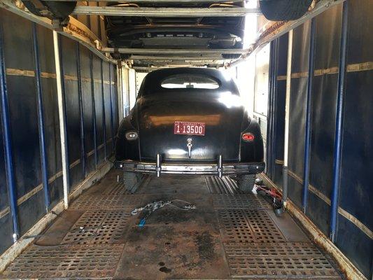 Loaded up and ready to go, classic car inside Double-Decker enclosed trailer.