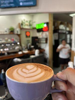 Morning cup of coffee topped with cinnamon and our baristas latte art