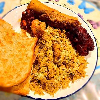 Biryani, Naan, lamb kebabs, chicken roll, Chicken tikka