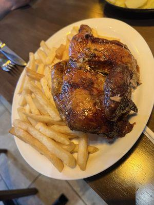 Half a pollo a la brasa with fries