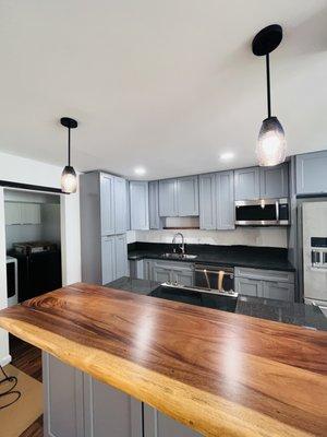 Mililani Townhouse kitchen light renovation.  Added bar pendant lighting and recessed fixtures.