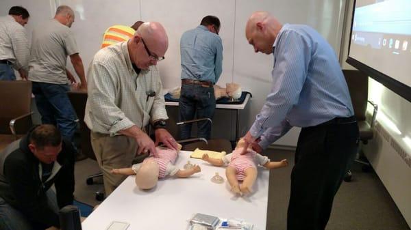 Infant cpr class in Seattle Wa. Two fingers center of chest. 1.5 inches or 1/3 depth at 100-120/ minute.