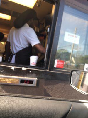 The employee that has taken the Dunkin vow of silence.