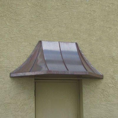 a small copper awning is always welcoming