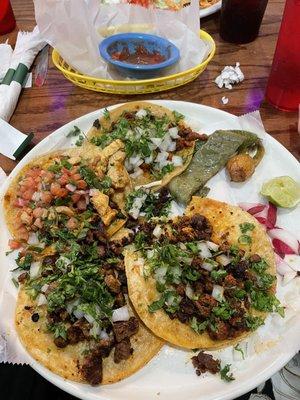 Al pastor, carne asada, chorizo, and chicken tacos