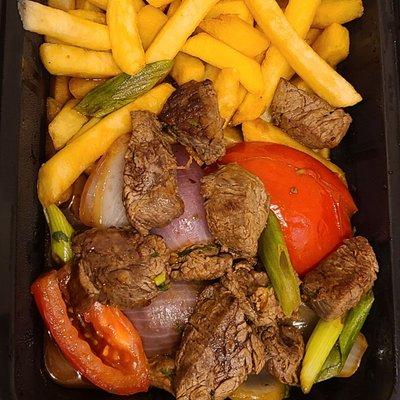 Lomo Saltado delivered via Door Dash.