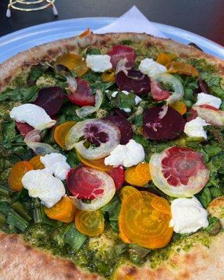 The prettiest and tastiest pie you've ever seen. all the floral vibes. Beets, greens&chèvre, garlic scape pesto.