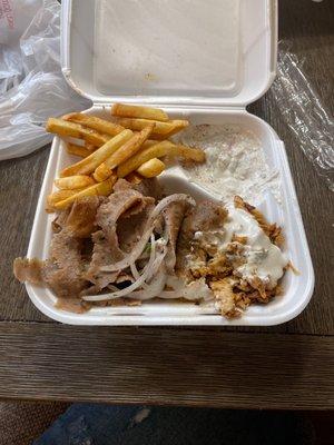 Combination plate with fries and Grecian dip.