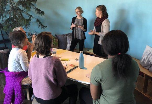 An intern and her classmate from the Dietitics program at the university give a nutrition talk in our community space.