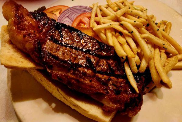 Steak sandwich and fries