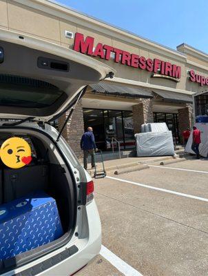 Our new mattress is all loaded in our car.