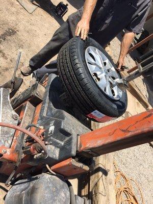 Troy popping on a new tire