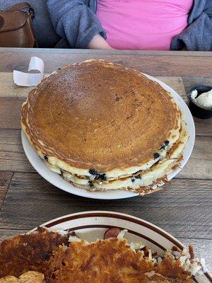 Blueberry pancakes and a Kielbasa Omelette with hash brown potatoes.