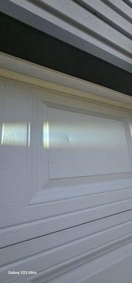 Does your garage door have a ding like this with no scratches, scraps, or creases?  You possibly have recent hail damage to your home...