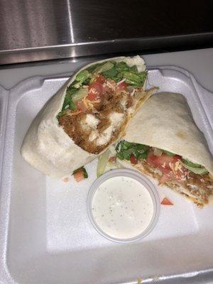 Delicious crispy chicken wrap served with homemade ranch.